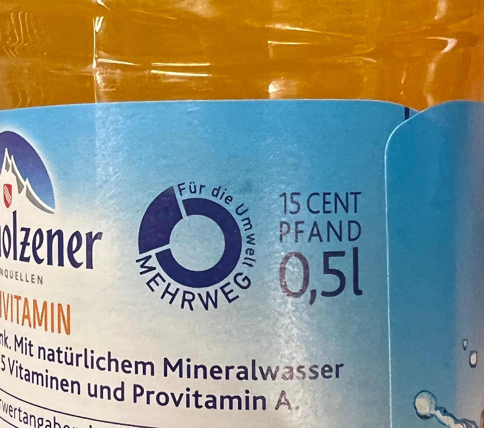 Image of a multi-use deposit on a bottle of fruit juice